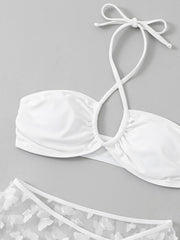 White three-piece bikini set